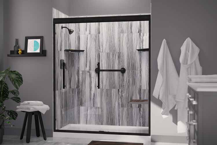 Shower with glass door and gray/white panel siding